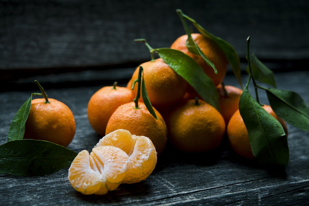 Mandarins on dark wood